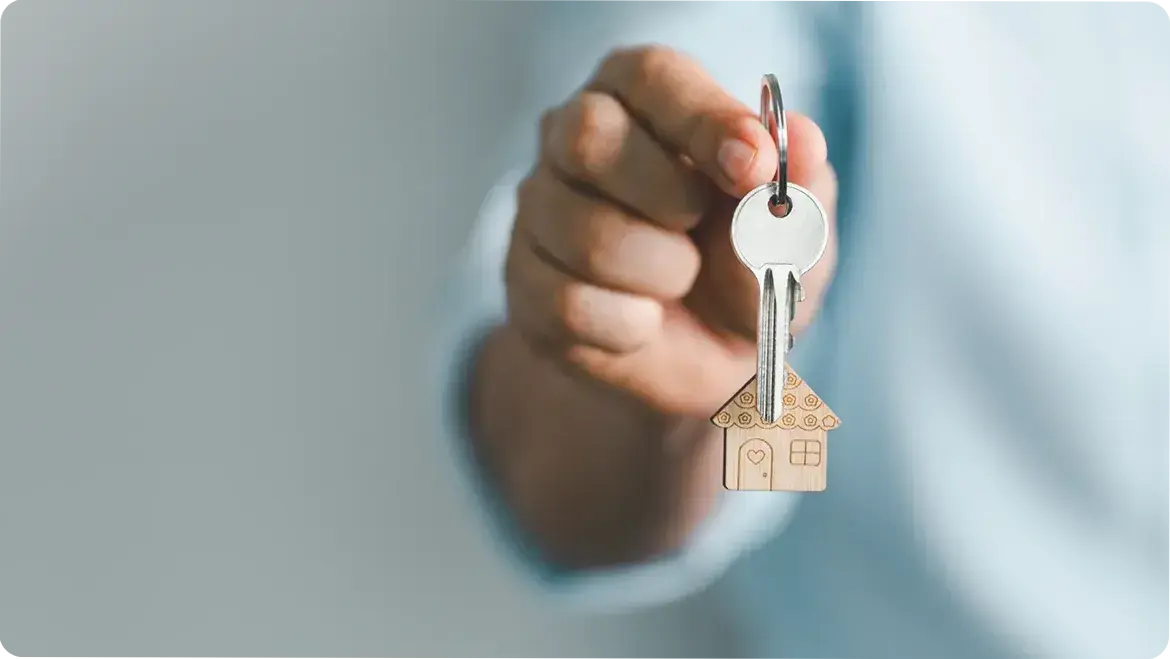 Person holding house keys