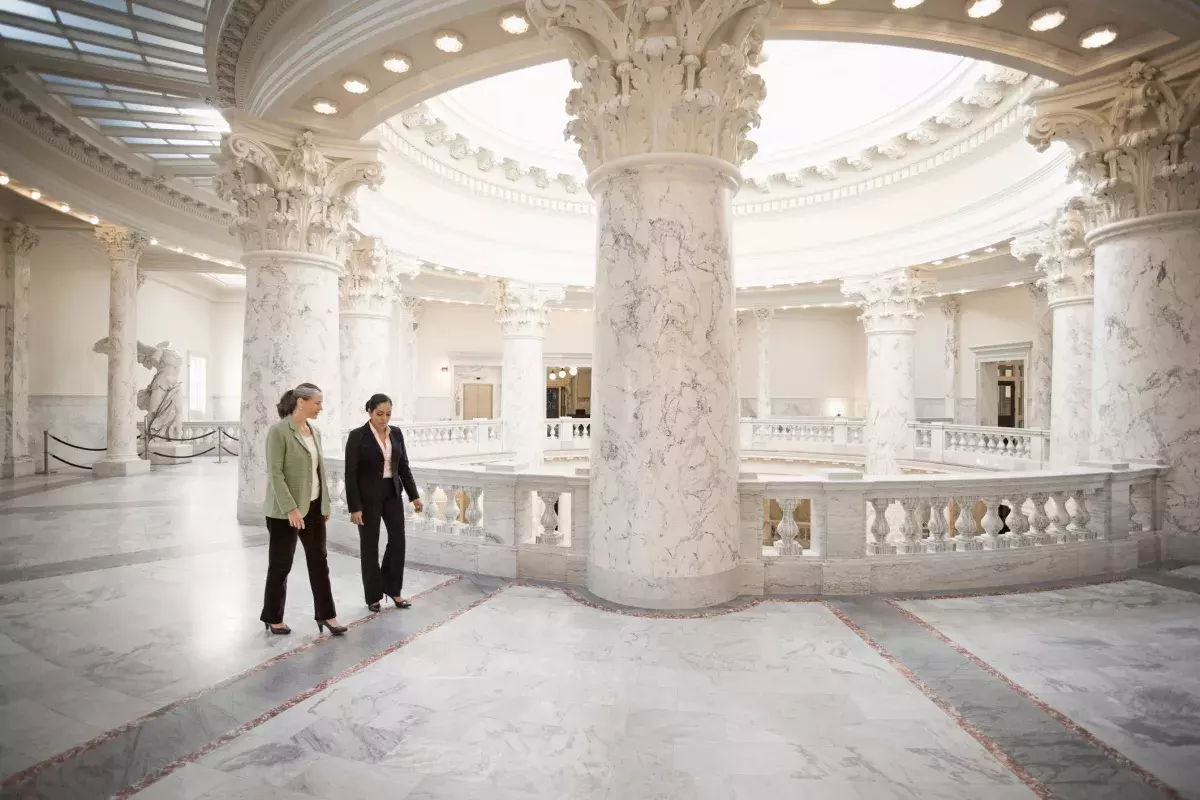 people walking in government building