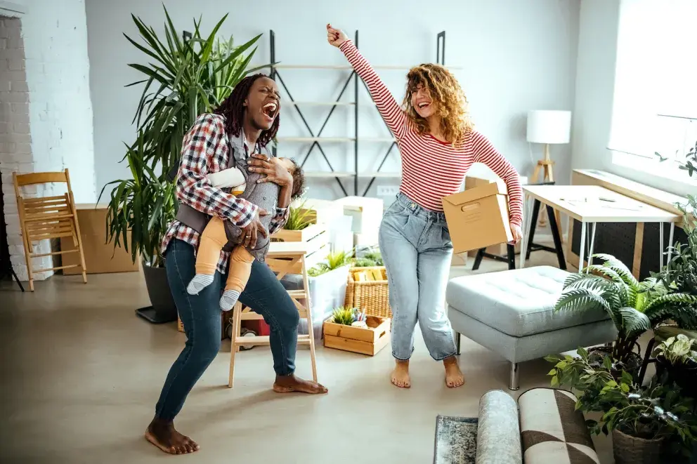 family celebrating in new home