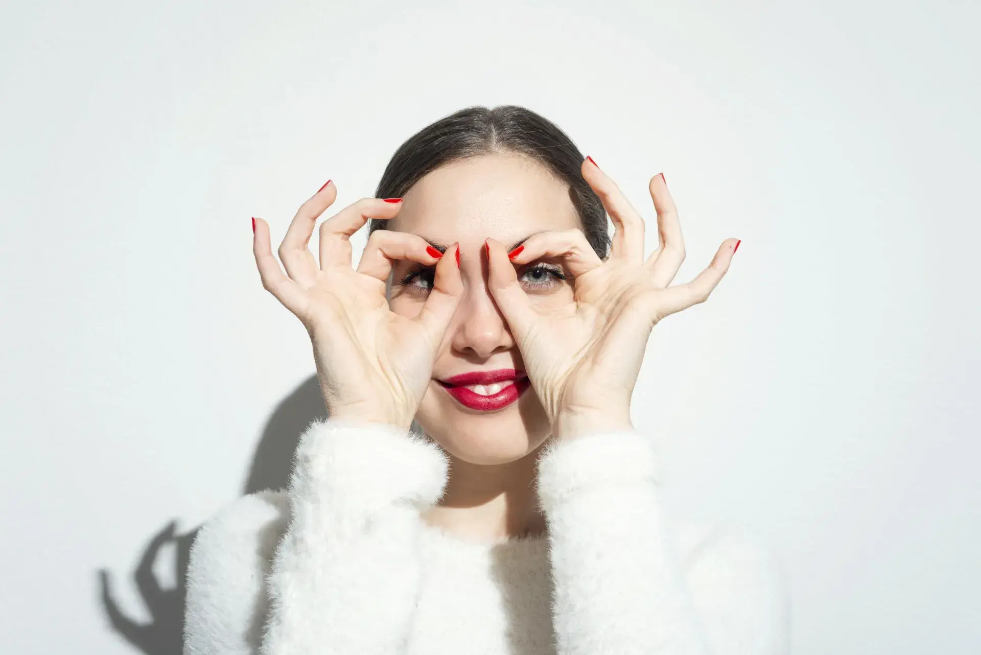 Woman covering her eyes