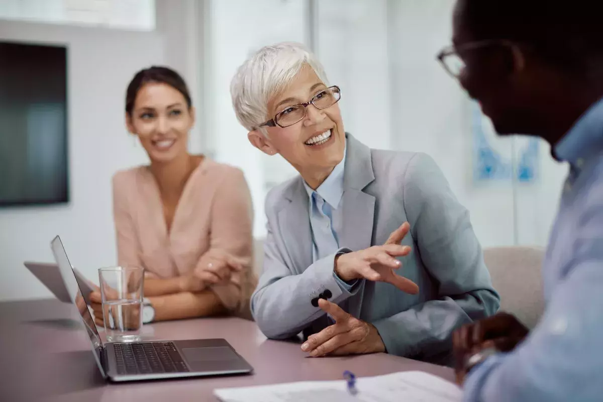 people talking in office