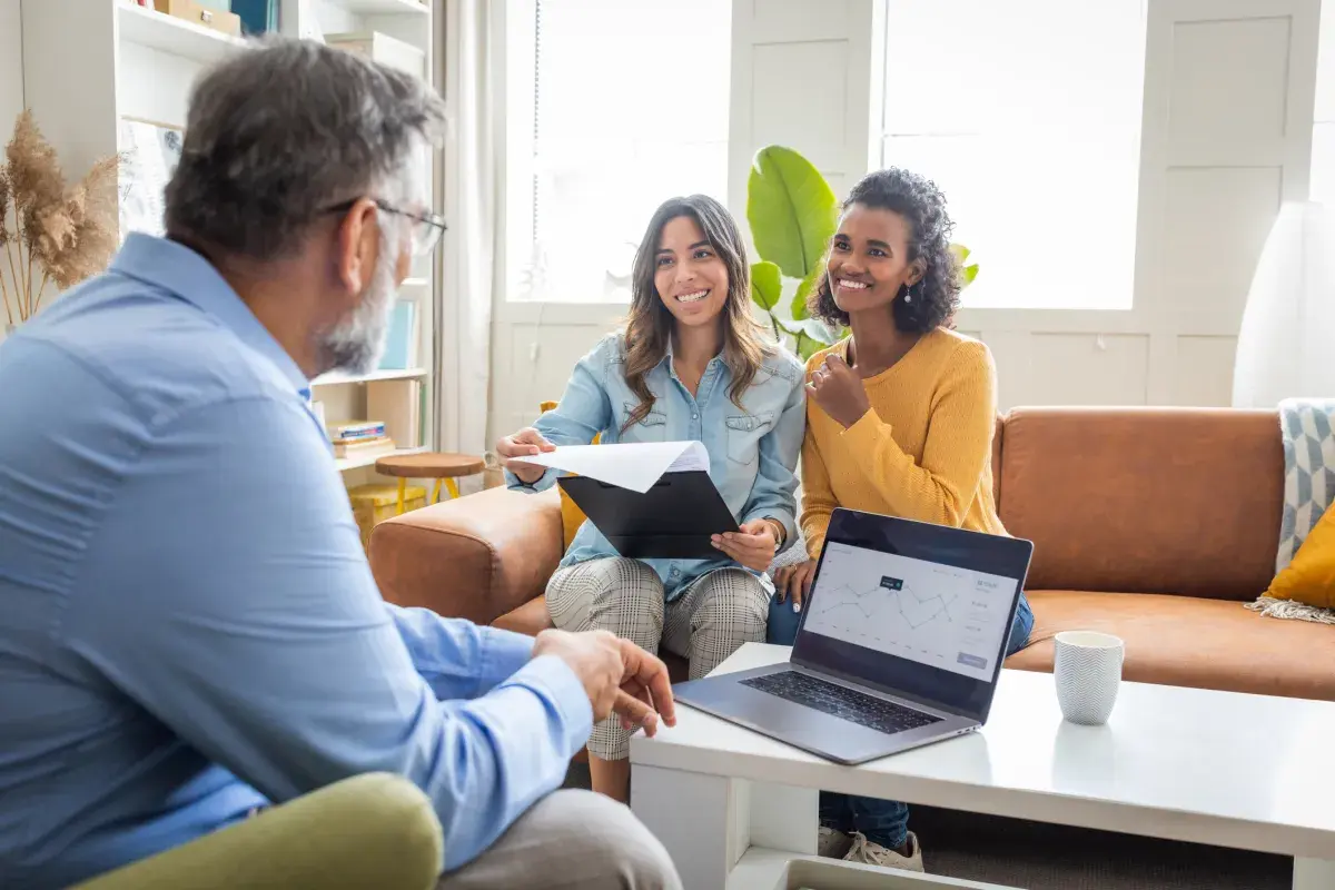 Two women meeting with counselor
